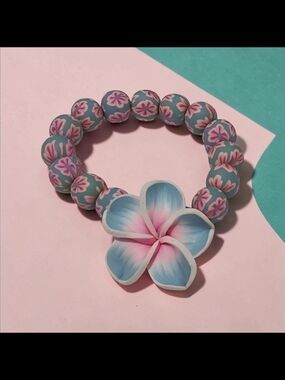 10/ $10 New Blue & Pink Floral Beaded Bracelet with Plumeria Charm